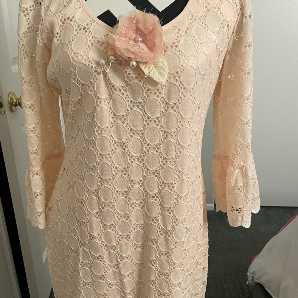 Very pretty and comfortable Peach dress.  Great for summer - very light lining